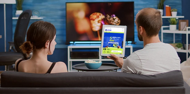 Family watching live TV in 4K